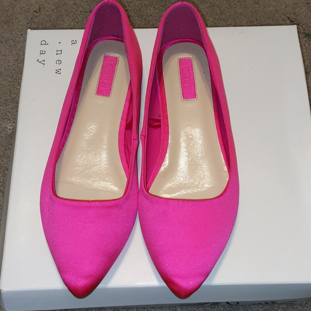Bright pink flats